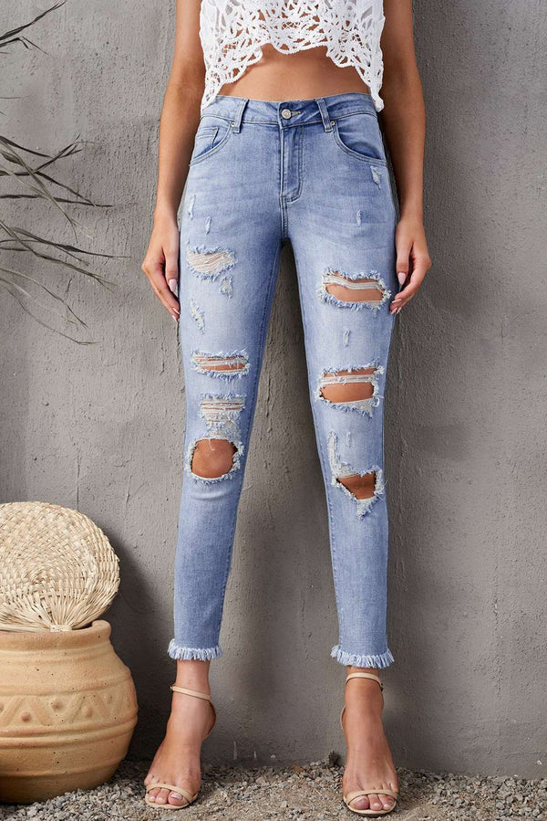 Mid Rise Distressed Fray Hem Skinny Jeans